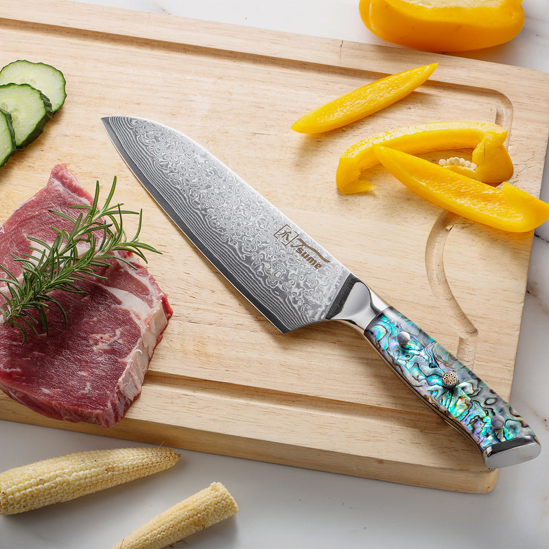 santoku messer abalone auf schneidebrett